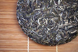 600 grams top grade unfermented Pu erh black tea cake